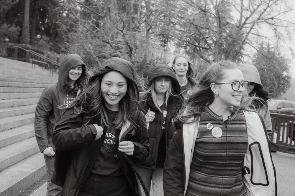 A group of NWRE Action supporters walking